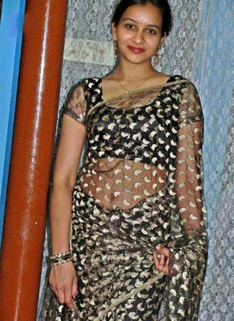 indian aunty showing|Saree without blouse .